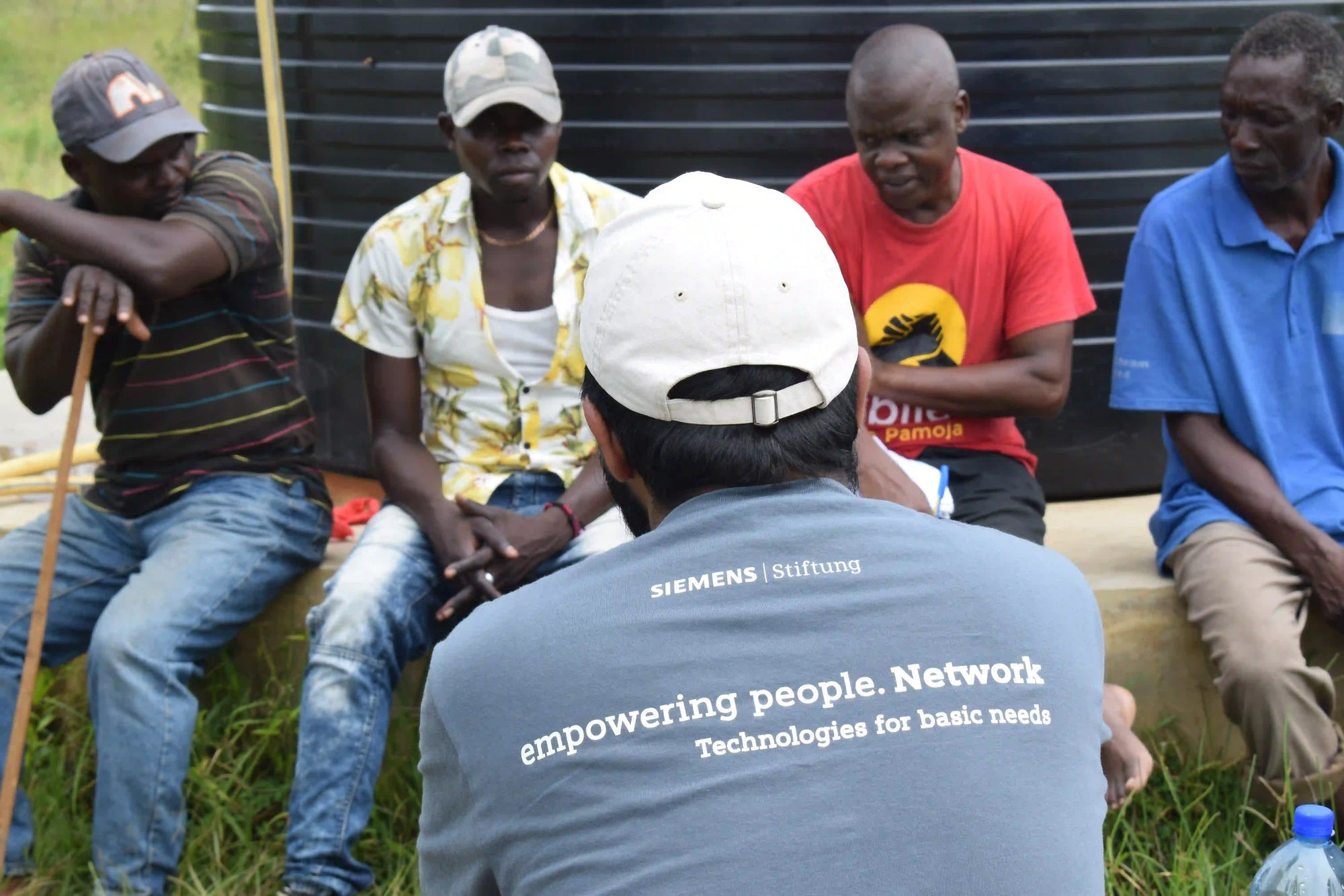 Sustainable organic t-shirts from GREEN SHIRTS for the international Siemens Foundation team at Safe Water Enterprises in Kenya.