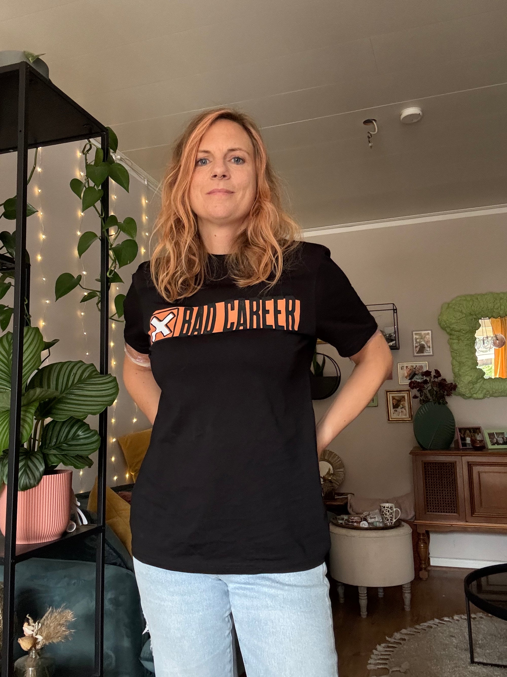 Sustainable limited edition T-shirt in sand-beige, featuring premium "X" logo branding from the exclusive Nana Fink "Bad Career" collection.