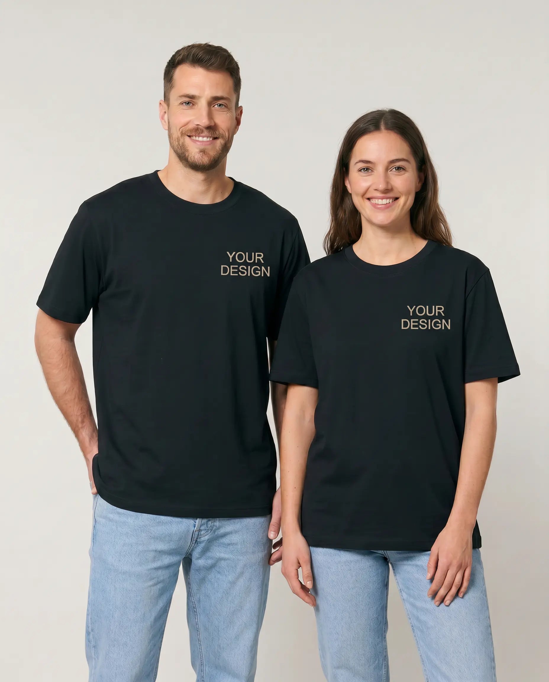 Sustainable T-shirt made from Fair Trade organic cotton, printed with a logo as corporate fashion. A model presents the shirt for illustration purposes with the placeholder 'Your Logo' on the left chest.